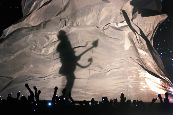 Super Bowl rocked by risque purple curtain raiser